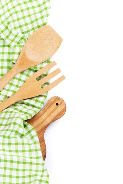 Wooden kitchen utensils and towel. — Stock Photo, Image