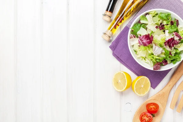 Fresh healthy salad and condiments — Stock Photo, Image