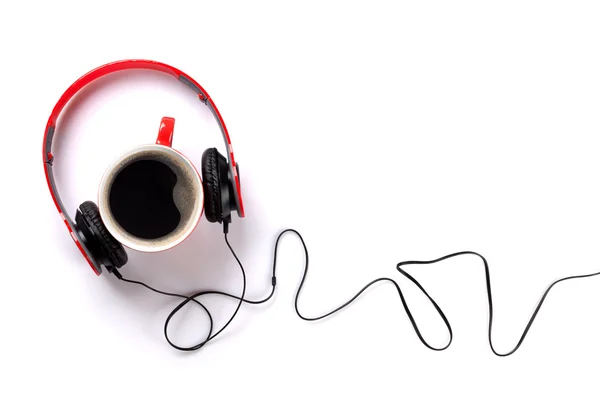 Fejhallgató és a csésze kávé — Stock Fotó