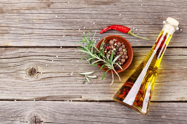 Herbs and spices on wooden table — Stock Photo, Image