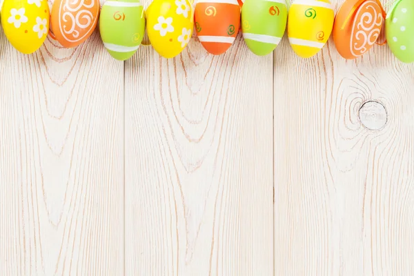 Easter eggs on wooden table — Stock Photo, Image