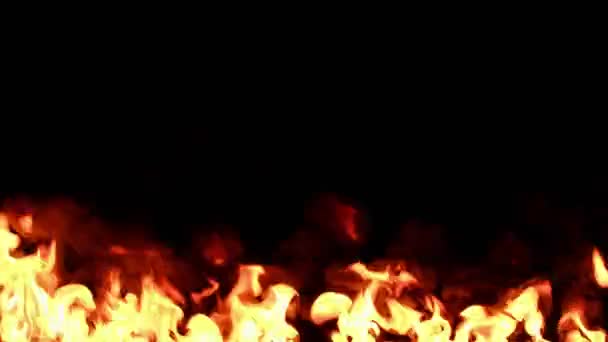 Real fire burning with black smoke on black background. — Stock Video