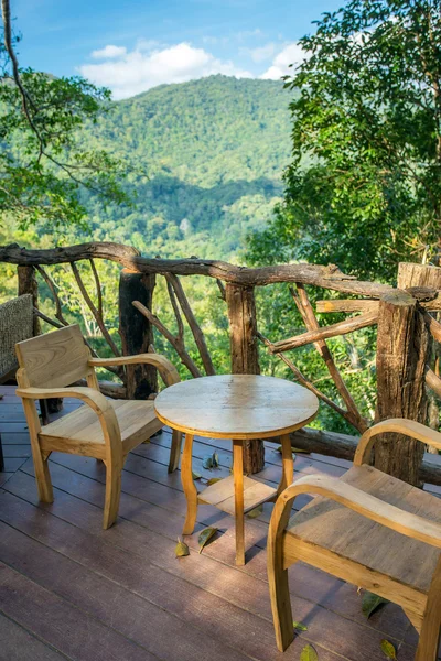 Wooden table and chairs in cafe