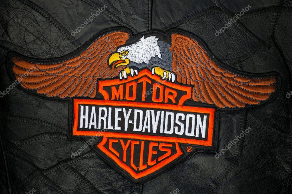 CHIANG MAI, THAILAND - NOVEMBER 9, 2014: Harley Davidson logo patch on a black leather biker jacket on November 9, 2014 in Chiang Mai, Thailand.