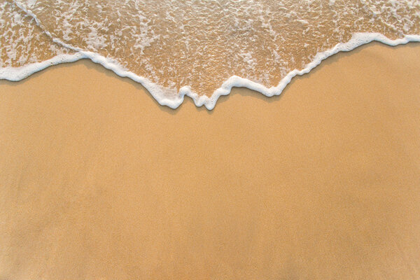 Wave on sand beach