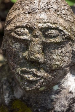 Stone statue in Tuk-Tuk village