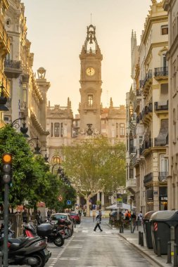Valencia, Spain - April 8, 2024: Valencia City Hall at the Plaza del Ajuntament square at sunset