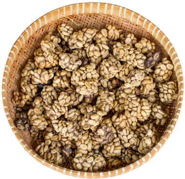 Ttray with digested coffee beans