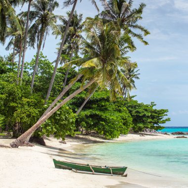 Boat on tropical beach on Karimunjawa