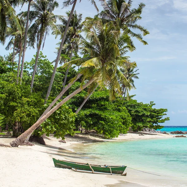 Boat on tropical beach on Karimunjawa — стокове фото