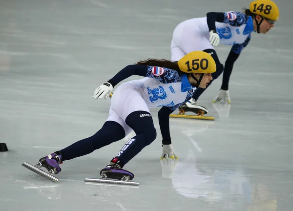 Ladies' 3000 m ohřívá krátké trati relé — Stock fotografie