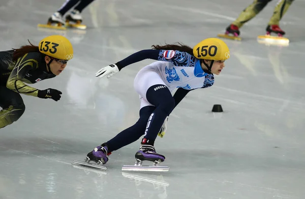 Ladies' 3000 m ohřívá krátké trati relé — Stock fotografie