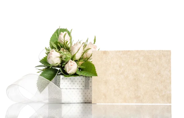 Gift box and white roses with empty card for you text on white b — Stock Photo, Image
