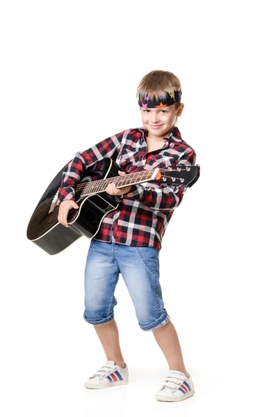 Boy is playing on guitar - isolated on white background — Stock Photo, Image