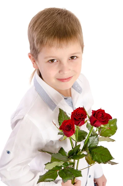 Kleiner Junge mit einer Rosen isoliert auf weißem Hintergrund — Stockfoto