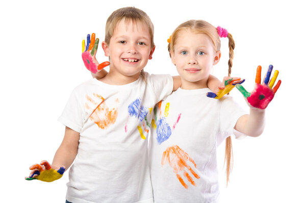 Funny boy and girl with hands painted in colorful paint  isolate