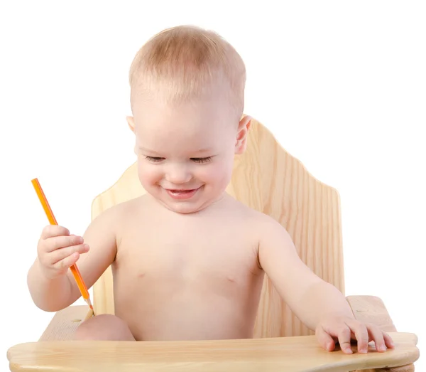 Een jongen trekt met een potlood, geïsoleerd op witte achtergrond — Stockfoto