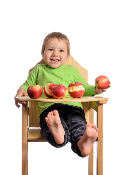 Cute child with red apples on white background — Stock Photo, Image
