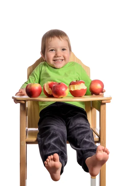Cute child with red apples on white background — Stock Photo, Image