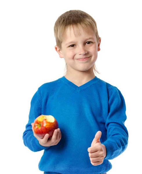 Young boy with red apple isolated on white — Stock Photo, Image