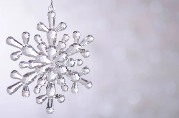 Transparent Toy Snowflake Bokeh Silver Christmas Lights Christmas Decoration — Stock Photo, Image