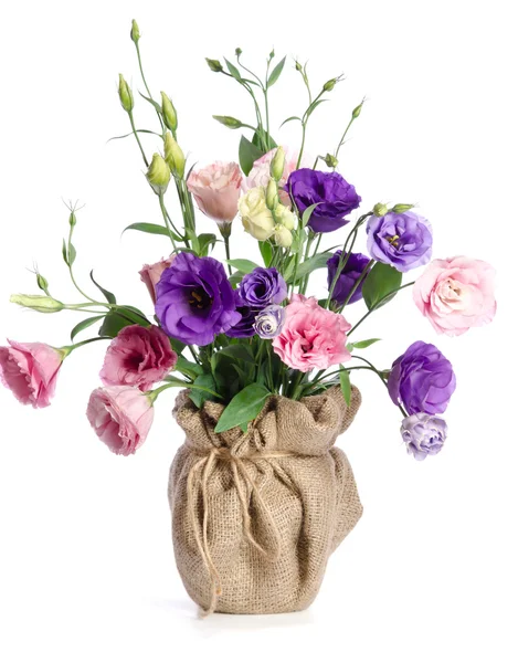 Beautiful bouquet of eustoma flowers in flowerpot — Stock Photo, Image