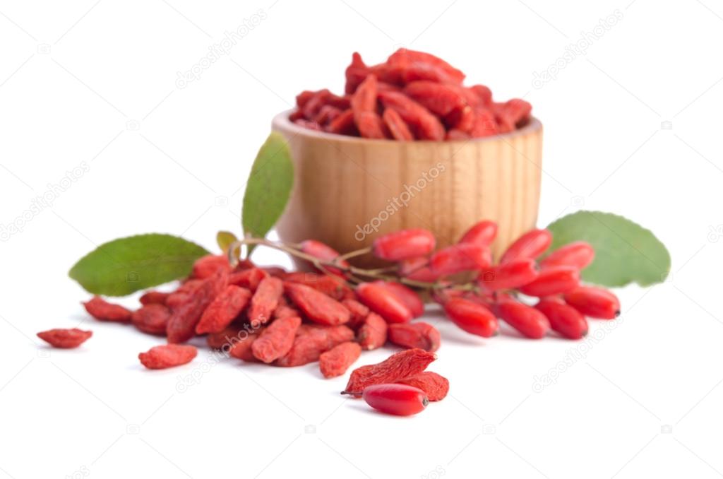 berberries and goji berries isolated on white background