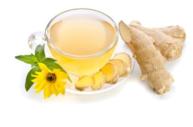 Cup of tea with  ginger slices and  Echinacea flower near isolat clipart