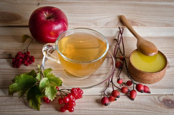 Still life from cup of tea , honey and  berries — Stock Photo, Image