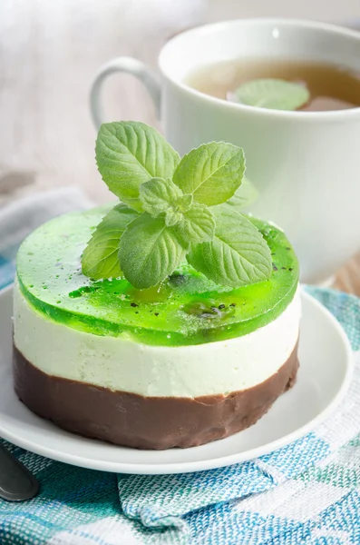 Herbal tea with cake on wooden background. — Stock Photo, Image