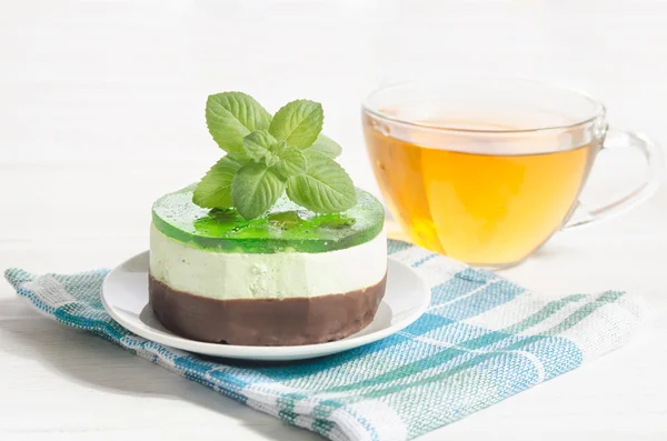 Herbal tea with cake on wooden background. — Stock Photo, Image