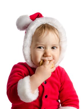 Komik bebek Noel Baba giysili kırık beyaz backgro yiyor.