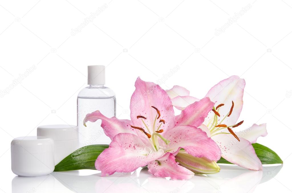 cosmetic set for skin care on a white background with flowers li