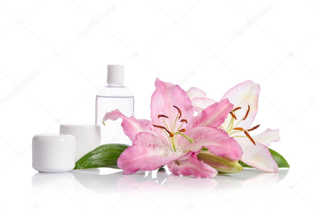 cosmetic set for skin care on a white background with flowers li