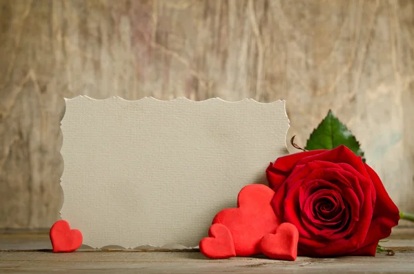 Red rose with paper for text and handemade valentines around on — Stock Photo, Image