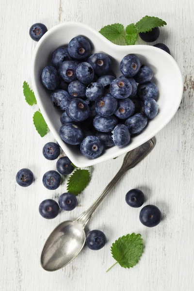 Healthy breakfast of muesli, berries with yogurt and seeds — Stock Photo, Image