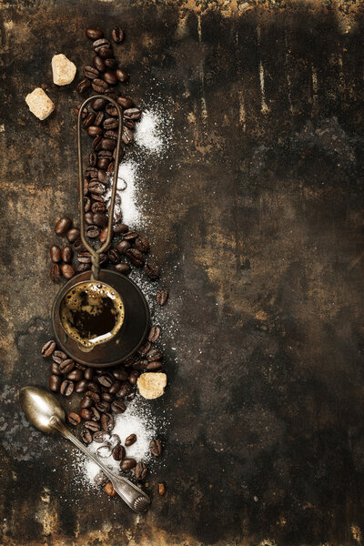 Coffee composition on dark rustic background