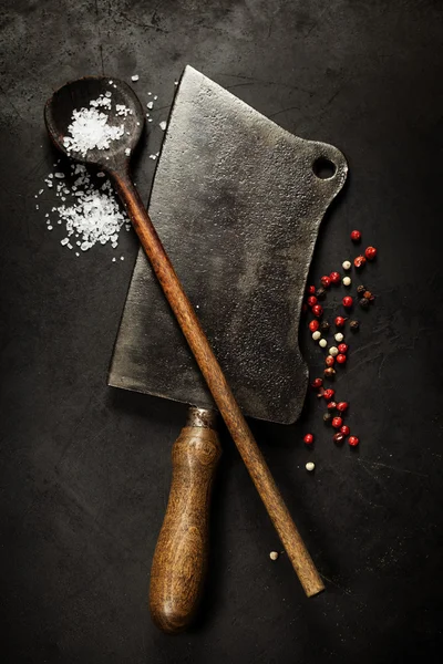 Old wooden spoon and Meat cleaver knife — Stock Photo, Image
