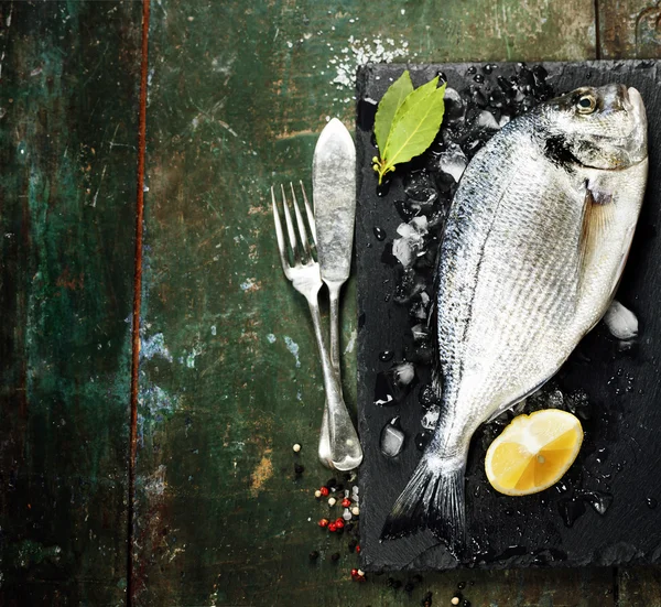Food background with Fish and Wine