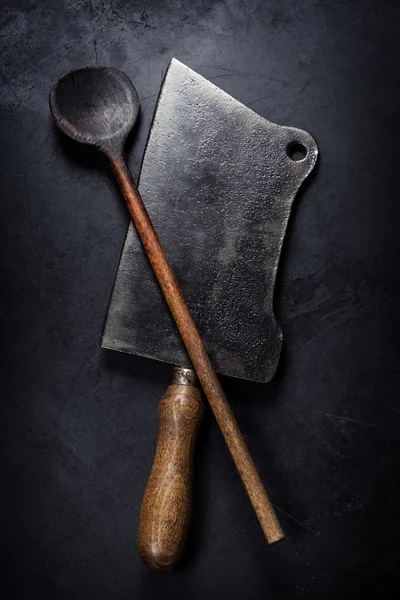 Old wooden spoon and Meat cleaver knife — Stock Photo, Image