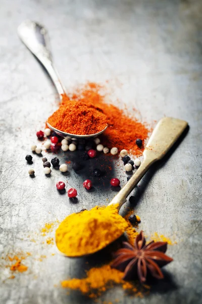 Spoons with spices — Stock Photo, Image