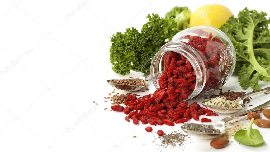 Various superfoods on white background