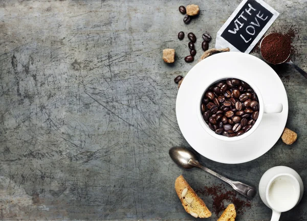 Coffee cup with beans — Stock Photo, Image