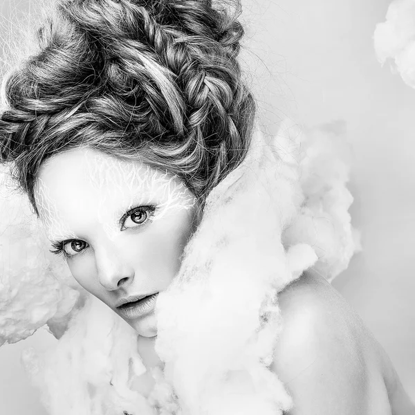 Romantic beauty with magnificent hair wandering in clouds. Fine art black-white studio fashion portrait. — Stock Photo, Image