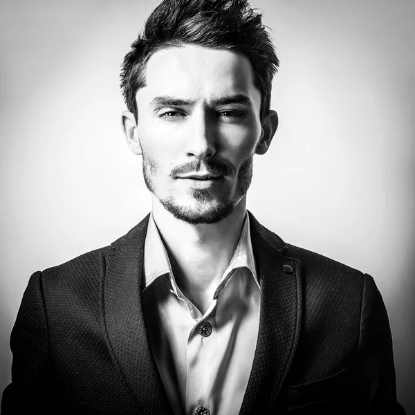 Elegant stylish handsome man. Black-white studio fashion portrait. — Stock Photo, Image