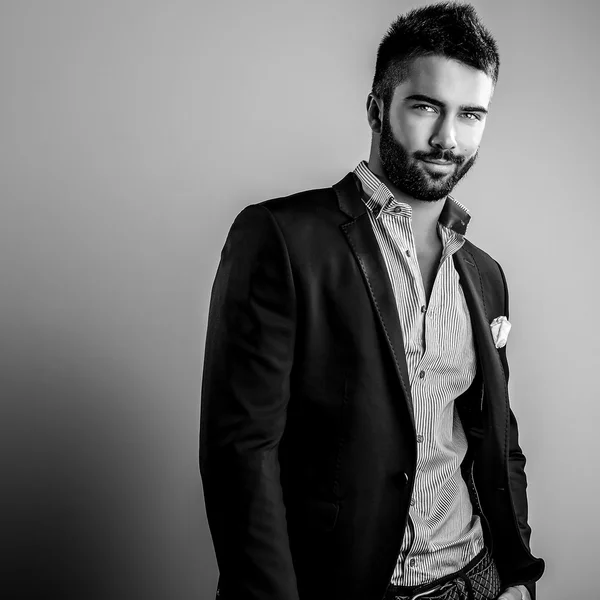 Elegant young handsome man. Black-white studio fashion portrait. — Stock Photo, Image