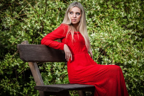 Outdoors portrait of beautiful young blond woman — Stock Photo, Image