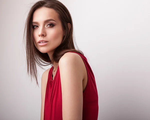 Studio portrait of beautiful young brunette girl — Stock Photo, Image