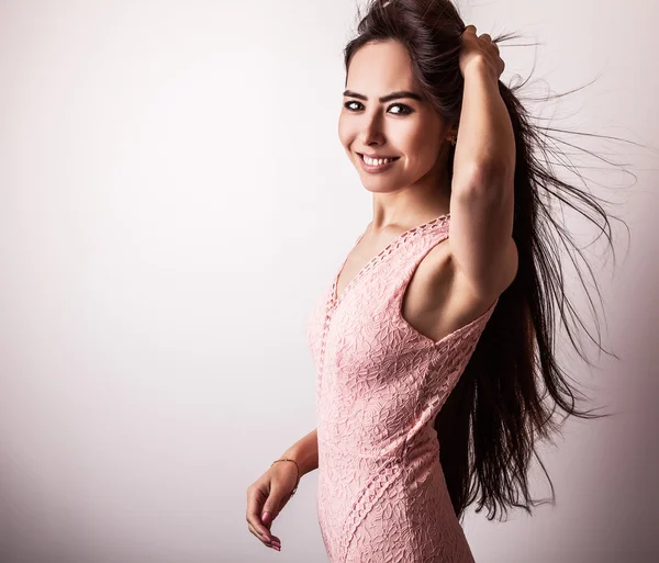 Studio portrait of long hair beautiful young woman — Stock Photo, Image