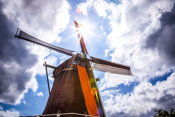 Dutch windmills with dramatic cloudy sky. — Stock Photo, Image